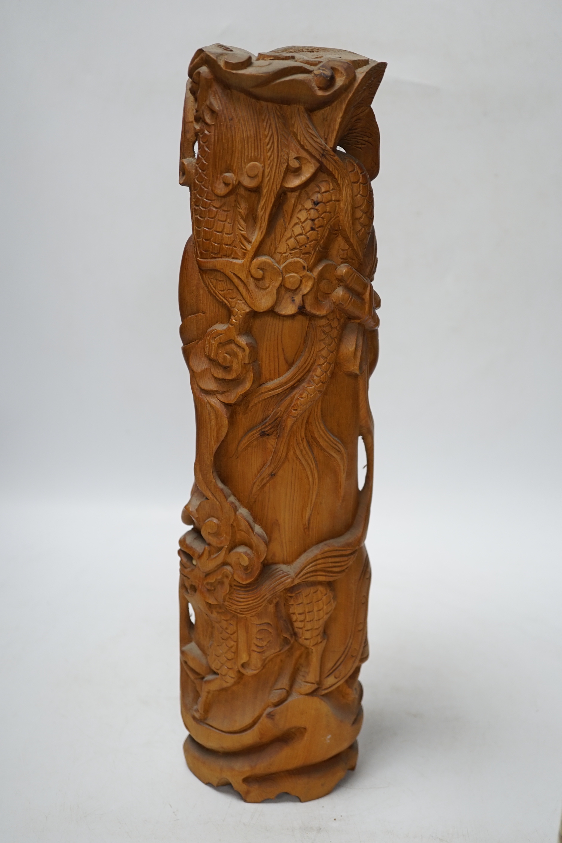 A Chinese carved wood figure of Shou Lao and a Chinese 'dragon' vase, largest 39cm high